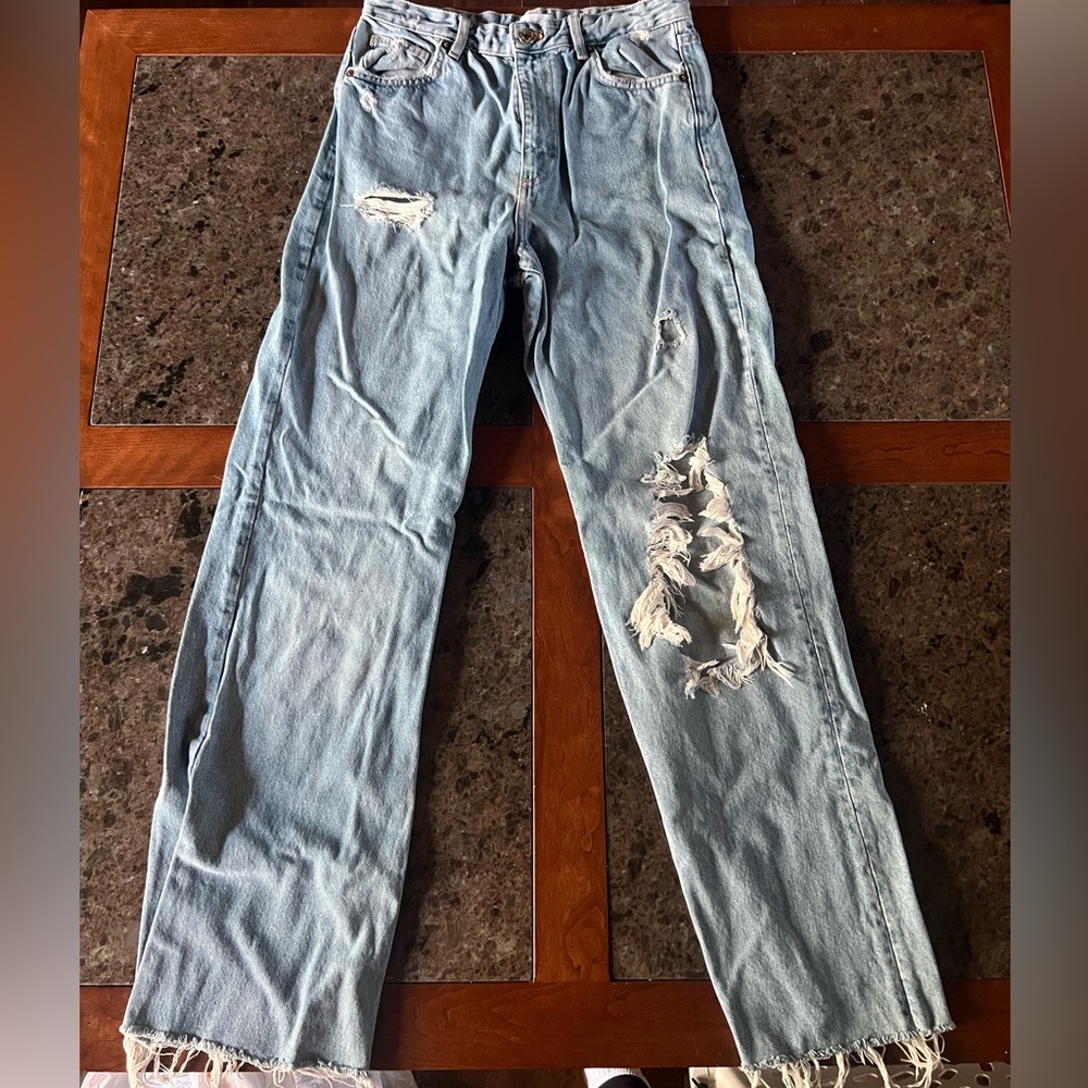 Distressed boyfriend jeans